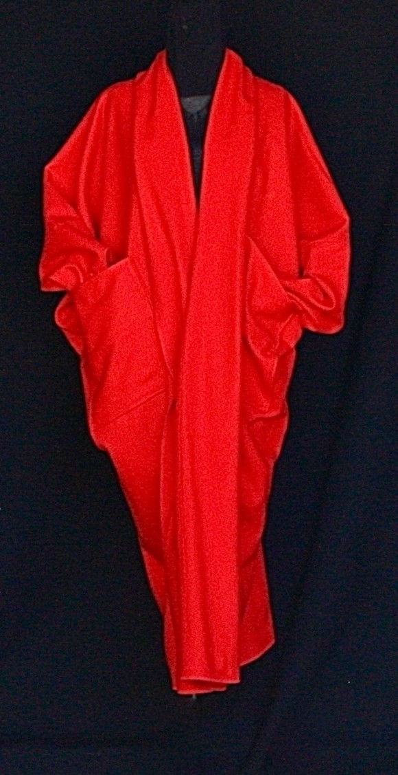 Manteau rouge vermillon Après la mousson